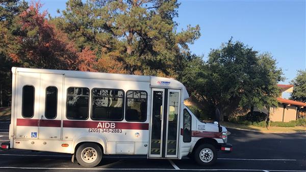 The AIDB bus sitting in the parking lot in front of the Tuscaloosa Regional Center The AIDB bus sitting in the parking lot in front of the Tuscaloosa Regional Center