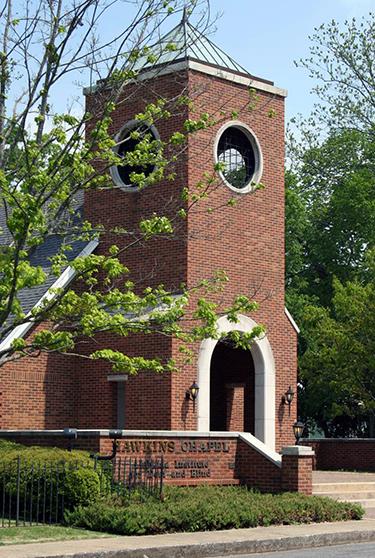 The front entrance to Hawkins Chapel on a sunny spring day 