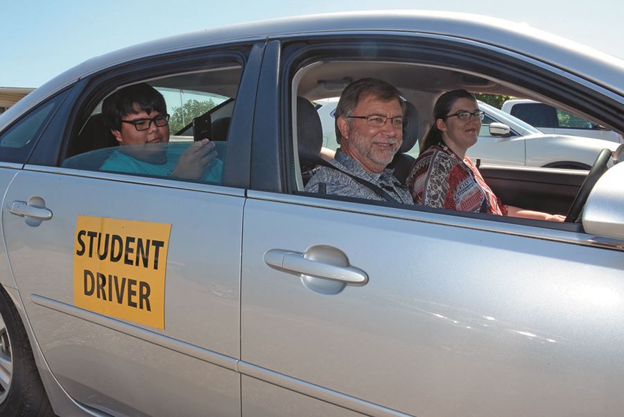 Two EHG clients receive driver's education instruction Two EHG clients receive driver's education instruction