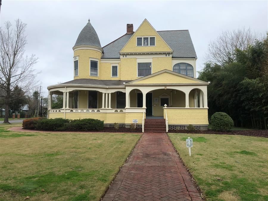 An 120 year old yellow house restored to be an office.