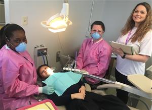 UAB School of Dentistry examining an ASB student 