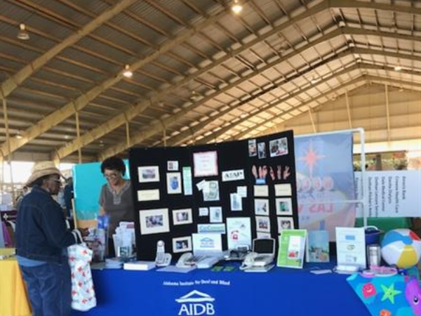 An AIDB booth at a conference. 
