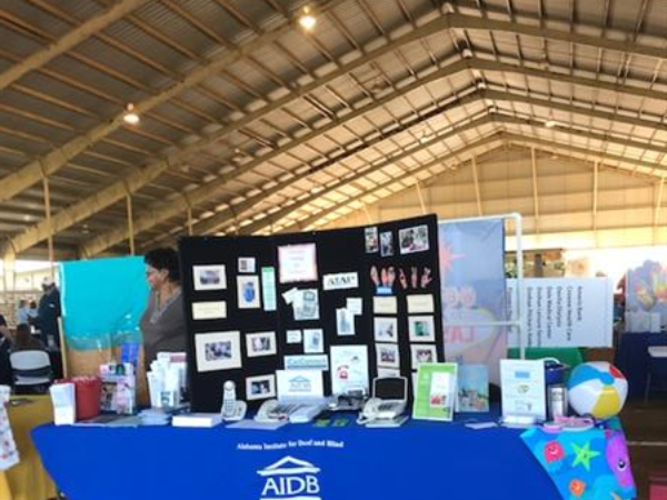 An AIDB booth at a conference. 