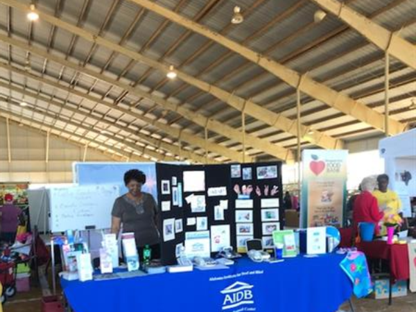 An AIDB booth at a conference. 