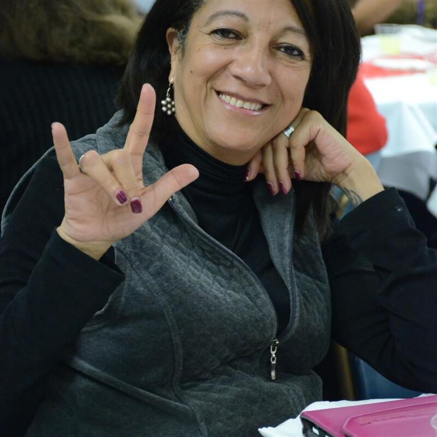 A woman signing \